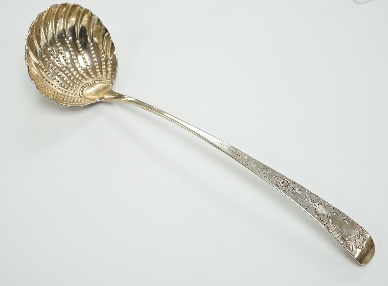 A George III Irish silver Old English pattern soup ladle, Michael Homer?, Dublin, 1775, 36cm, 7.1oz.